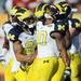Michigan safety Thomas Gordon celebrates with wide receiver Roy Roundtree after a blocked field goal attempt by South Carolina in the fourth quarter of the Outback Bowl at Raymond James Stadium of the in Tampa, Fla. on Tuesday, Jan. 1. Melanie Maxwell I AnnArbor.com